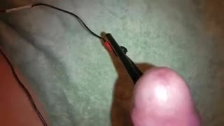 estim with cockring on