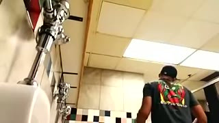 Urinal Spy with face 2